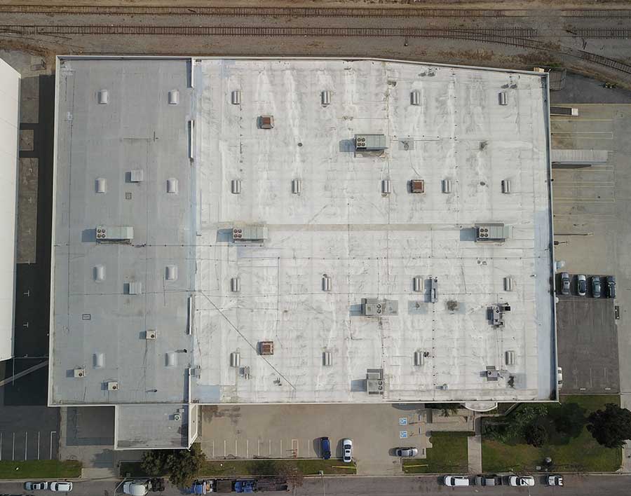 Restoration vs. Replacement: Maximizing Commercial Roof Performance Restoration vs. Replacement: Maximizing Commercial Roof Performance