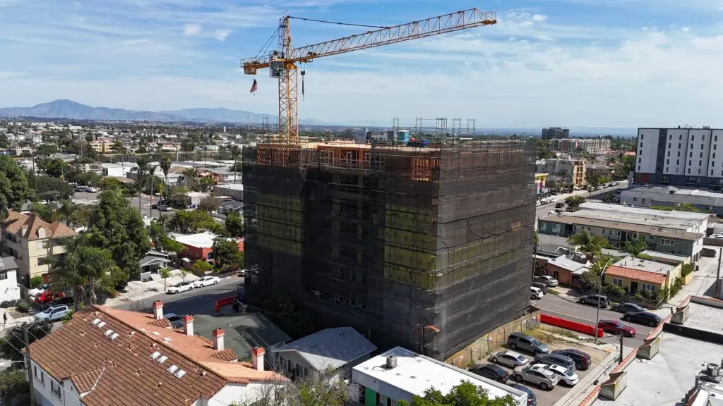 San Diego .5 million apartment building tops out
